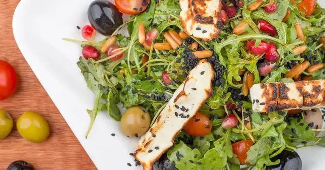 Grilled Halloumi Salad with Charred Courgette, Pomegranate and Tahini Dressing