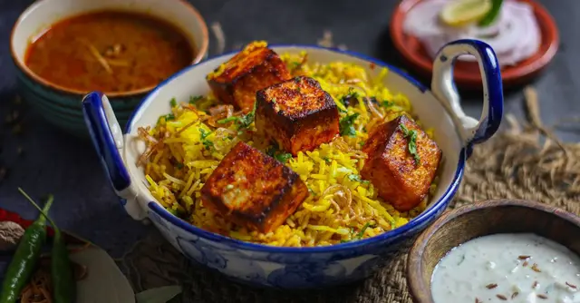 Indian Palak Paneer Biryani with Raita and Papadums