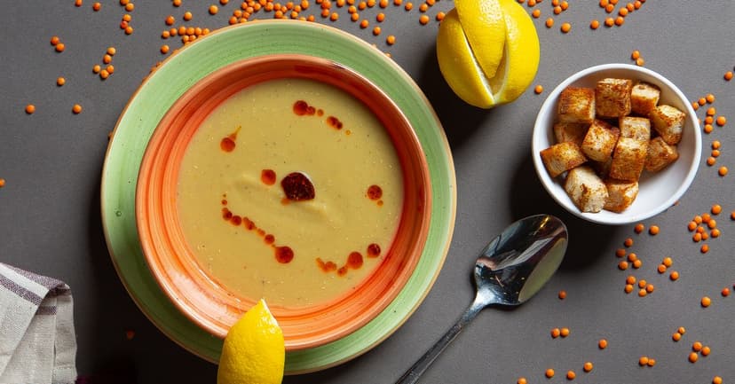 Spiced Red Lentil Soup with Crispy Garlic Croutons and Herb Oil