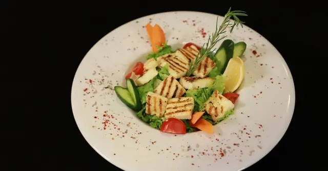 Warm Halloumi Salad with Pomegranate, Walnuts & Pomegranate Vinaigrette