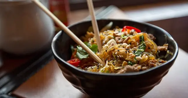 Thai-Inspired Peanut Noodle Bowl with Tofu & Vegetables