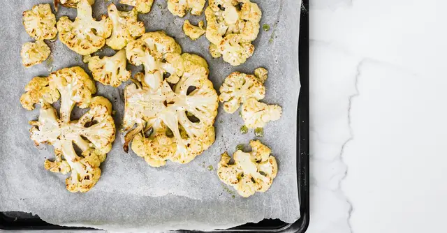 Pan-Seared Harissa Cauliflower Steaks with Whipped Feta and Pistachio Gremolata