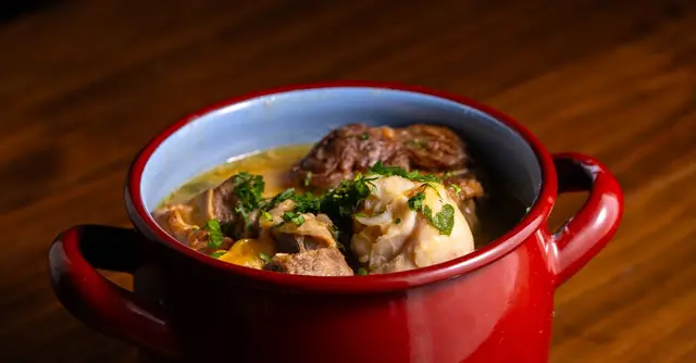 Slow-Braised Beef Shin with Tomato, Olives and Polenta