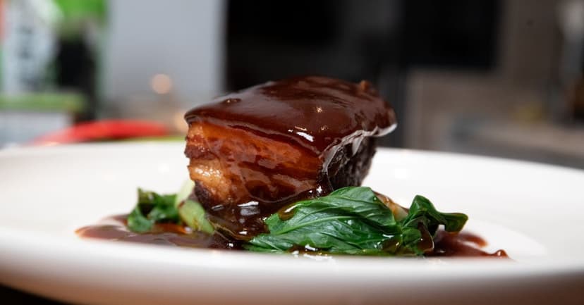 Italian Braised Pork with Creamy Polenta and Sautéed Greens