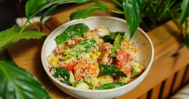 Mexican Quinoa Bowl with Black Beans and Avocado Lime Dressing