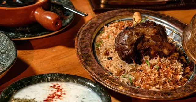 Braised Lamb Shoulder with Aubergine, Pomegranate & Mint
