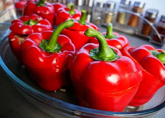 Peruvian Quinoa Stuffed Peppers with Aji Verde Sauce