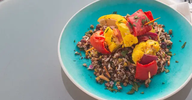 Peruvian Quinoa-Stuffed Peppers with Aji Amarillo Cream Sauce