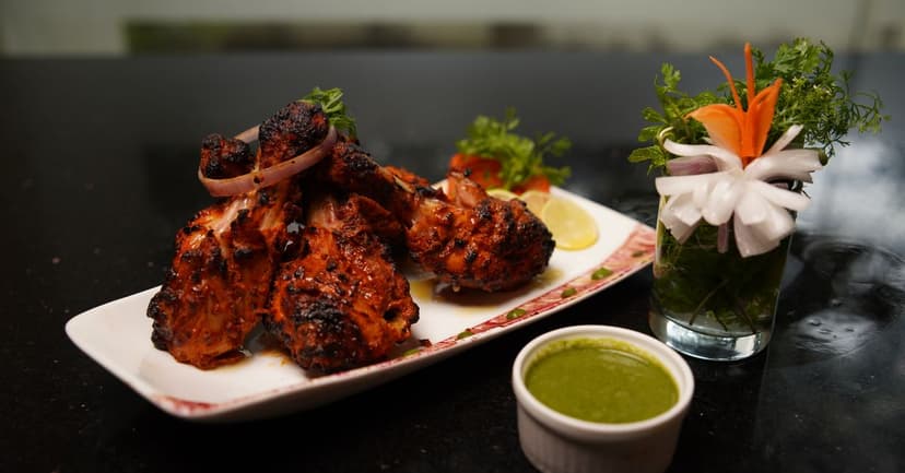Tandoori Chicken with Saffron Rice and Charred Cucumber Raita