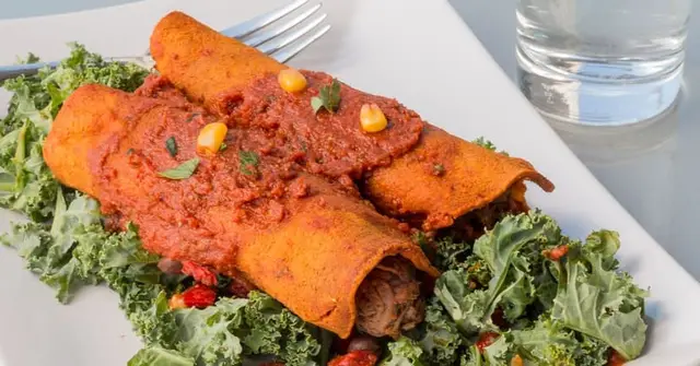Black Bean & Sweet Potato Enchiladas with Chipotle Tomato Sauce