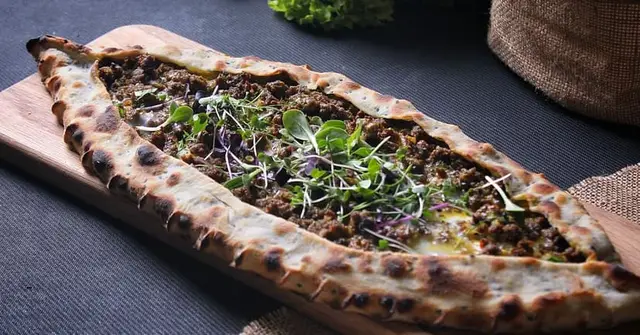 Turkish Lamb Pide with Herbed Yogurt and Roasted Vegetables