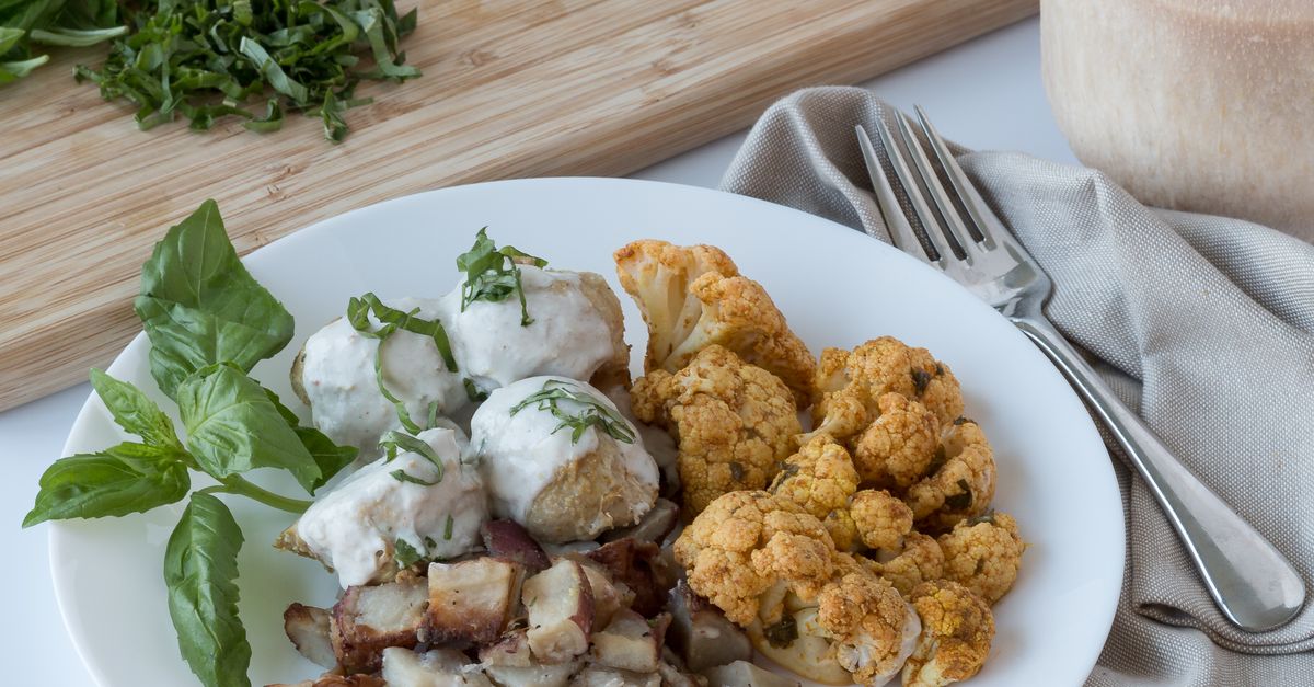 Turmeric Roasted Cauliflower with Quinoa and Tahini Dressing