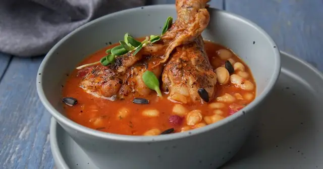 Braised Chicken Thighs with Cannellini Beans, Tomato and Sage